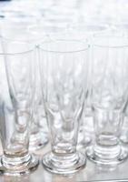 Many empty glasses in a line photo