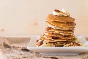 Almond banana pancake with honey photo