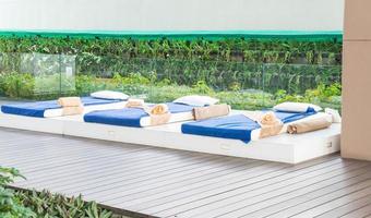 Outdoor massage bed in a spa salon photo