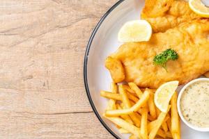 Fish and chips with french fries - unhealthy food photo