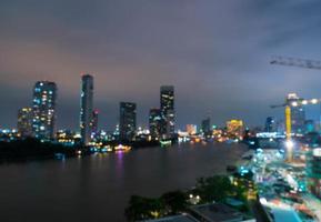 Abstract blur Bangkok city in Thailand at night photo