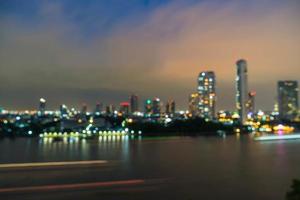 Abstract blur Bangkok city in Thailand at night photo