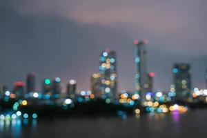 Abstract blur Bangkok city in Thailand at night photo