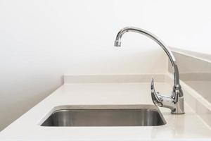 Faucet Sink and water tab decoration in kitchen room photo