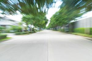 Abstract blur asphalt road - boost up colour and lighting processing style with sunflare effect photo