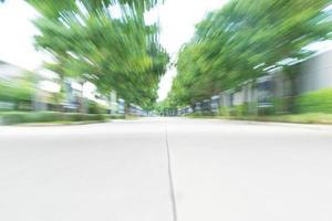 Abstract blur asphalt road - boost up colour and lighting processing style with sunflare effect photo