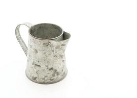 Iron jug on white background