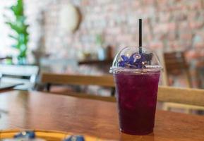 Iced tea pea on table photo