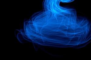 Glowing abstract curved blue lines photo