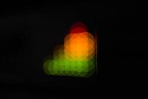 Blurred equalizer bars - abstract colorful dots photo