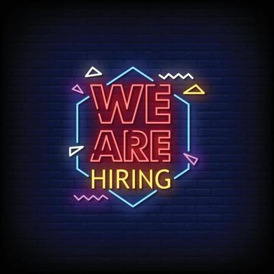 We are Hiring  Neon Signboard On Brick Wall