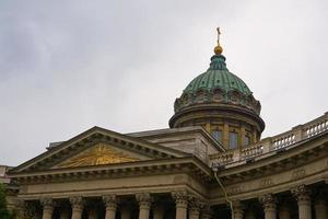 The dome of Kazan Cathedral with a cloudy sky in the background. photo