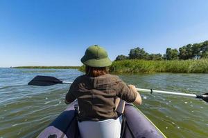 Young woman in the kayak photo