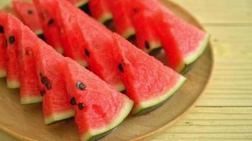 Fresh watermelon sliced on plate video