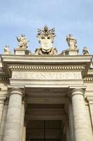 Marble sculptures of the popes on St. Peters Square in Vatican City photo