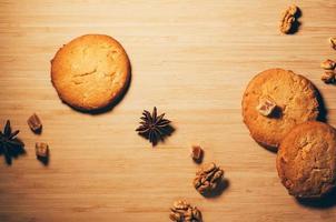 Biscuits with nuts and spicies on the kitchen table photo