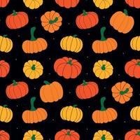 vector pattern of ripe pumpkins and dots on a black background