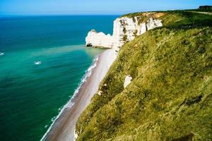 The White chalk cliffs of Etretat Normandie France photo