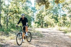 Mountain cyclists sitting on bicycles photo