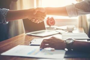 Business People Handshake Greeting Deal at work. photo