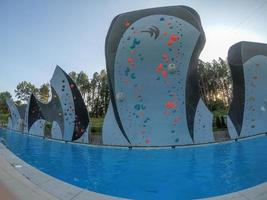 wall climbing over deep pool at national center in charlotte photo