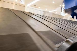 baggage claim conveyor belt at the airport photo