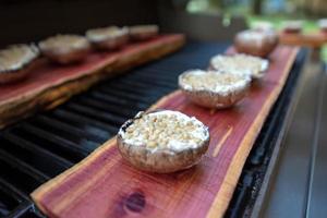 grilling portobello mushrooms on cedar plank photo