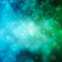 Light Blue, Green vector backdrop with dots.