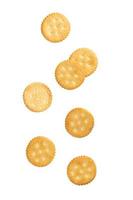 Cracker cookies falling isolated on white background photo