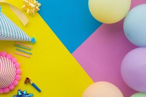 Happy birthday background, Flat lay colorful party decoration photo