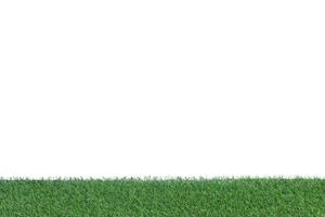 Artificial grass isolated on white background photo