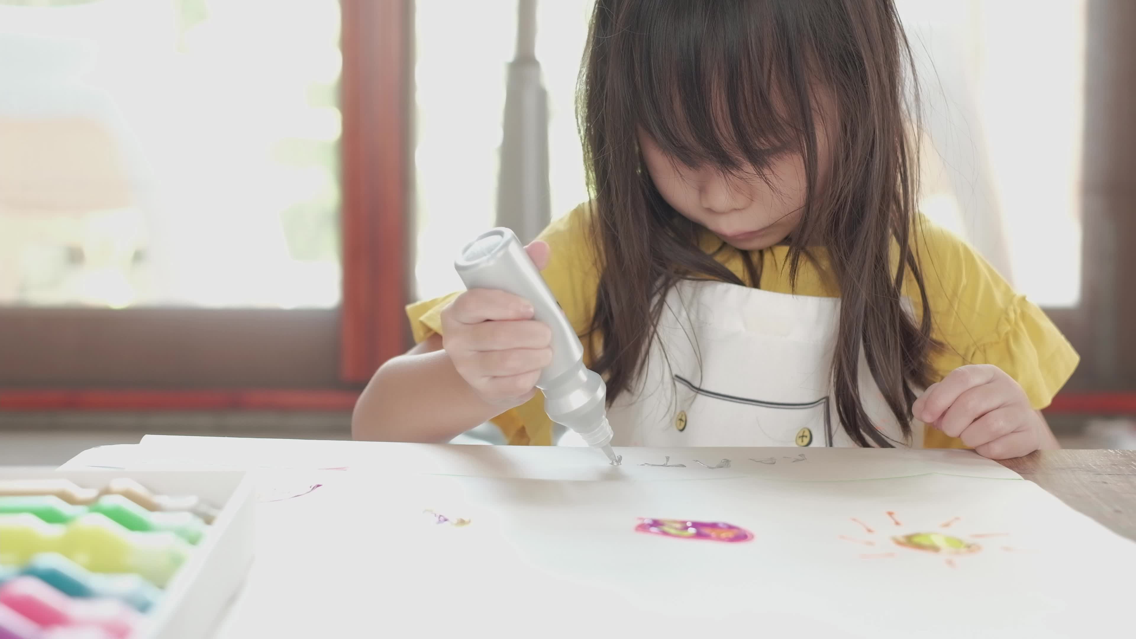 Kids Paint. Child Painting In White Sunny Study Room. Little Girl Drawing  Rainbow. School Kid Doing Art Homework. Arts And Crafts For Kids. Paint On  Children Hands. Creative Little Artist At Work.