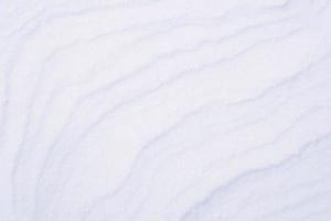 clean white snow texture made of ice crystals photo