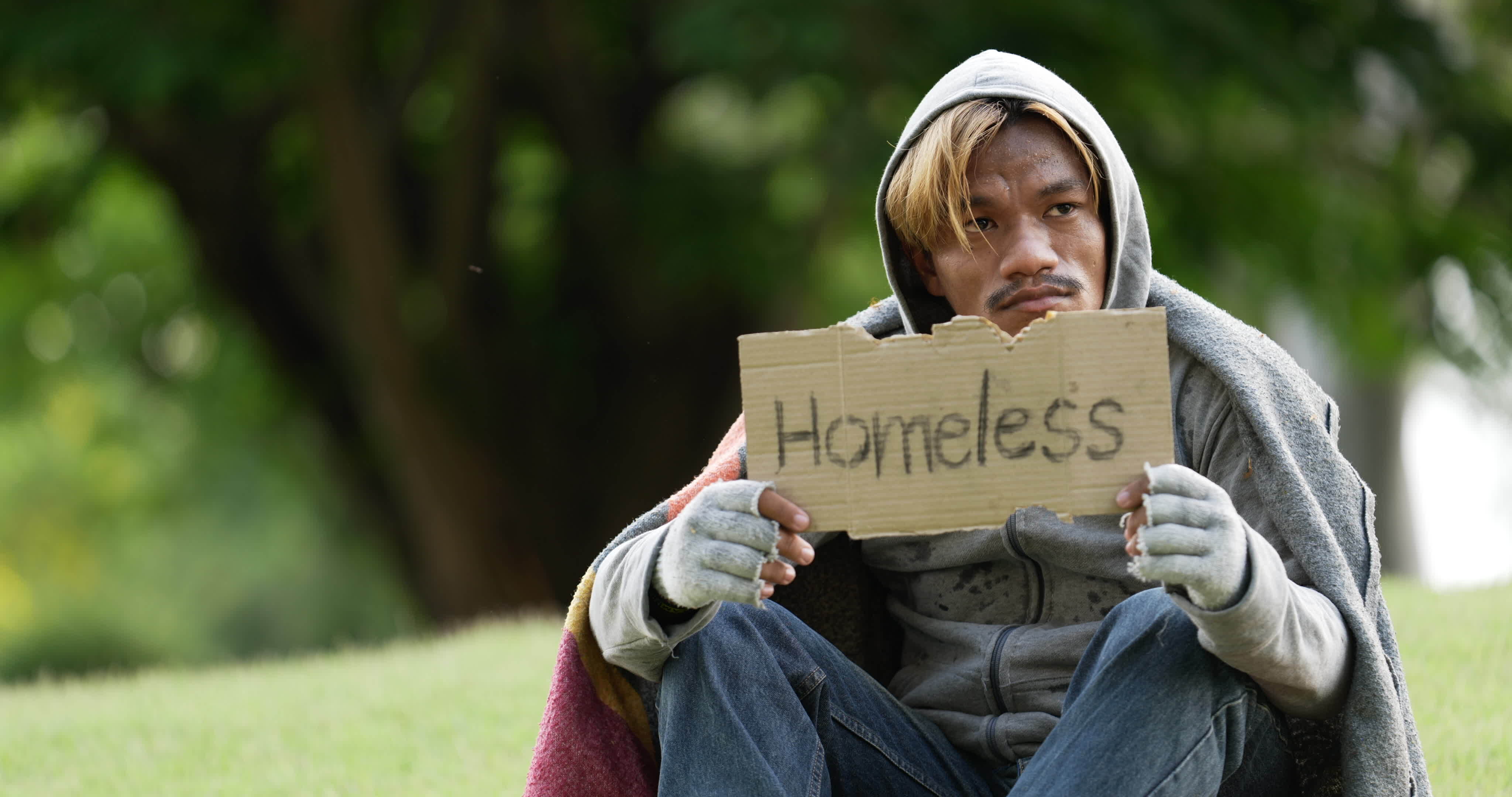 Rich man buys homeless man. Helping poor man.