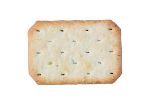 Saltine soda cracker isolated on white background photo