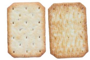 Saltine soda crackers isolated on white background photo