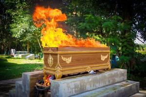 fire on the coffin for cremation photo