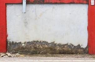 grunge street wall texture background with red border photo
