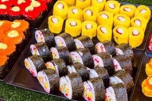 Sushi rolls on Thailand street food vender. photo