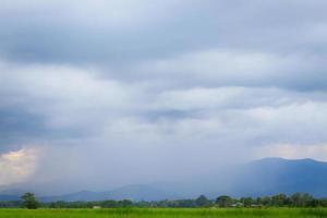 Bad weather landscape of countryside with rain photo