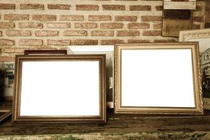 old photo frames on the wooden table