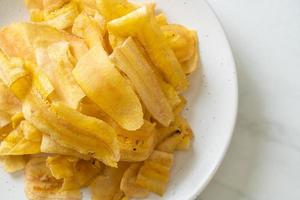 Banana Chips - fried or baked sliced banana photo