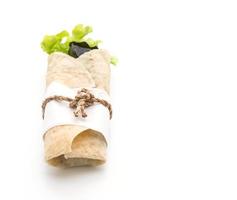 Wrap salad roll on white background photo