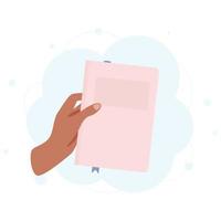 hand holding a book vector