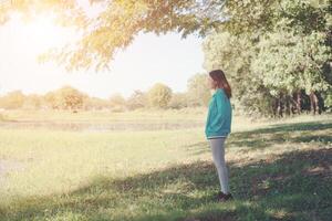 Woman looking away enjoying nature. photo