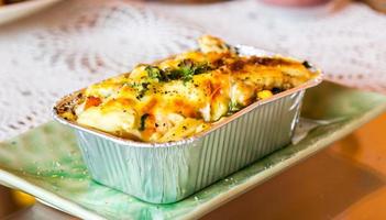 Lasagne ready meal in foil container. photo