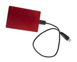 Red external hard disk storage backup drive for computer photo