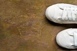 Comfortable canvas sneaker on sandstone photo