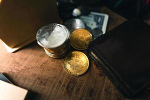 Bitcoin coins on a wooden desk photo