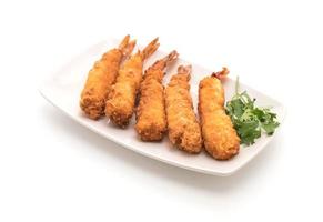 Batter-fried prawns on white background photo